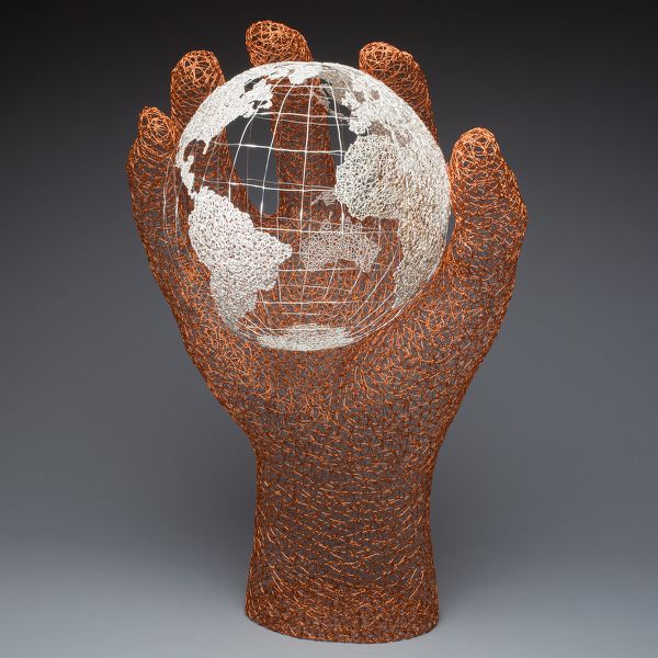 Hand Holding Globe